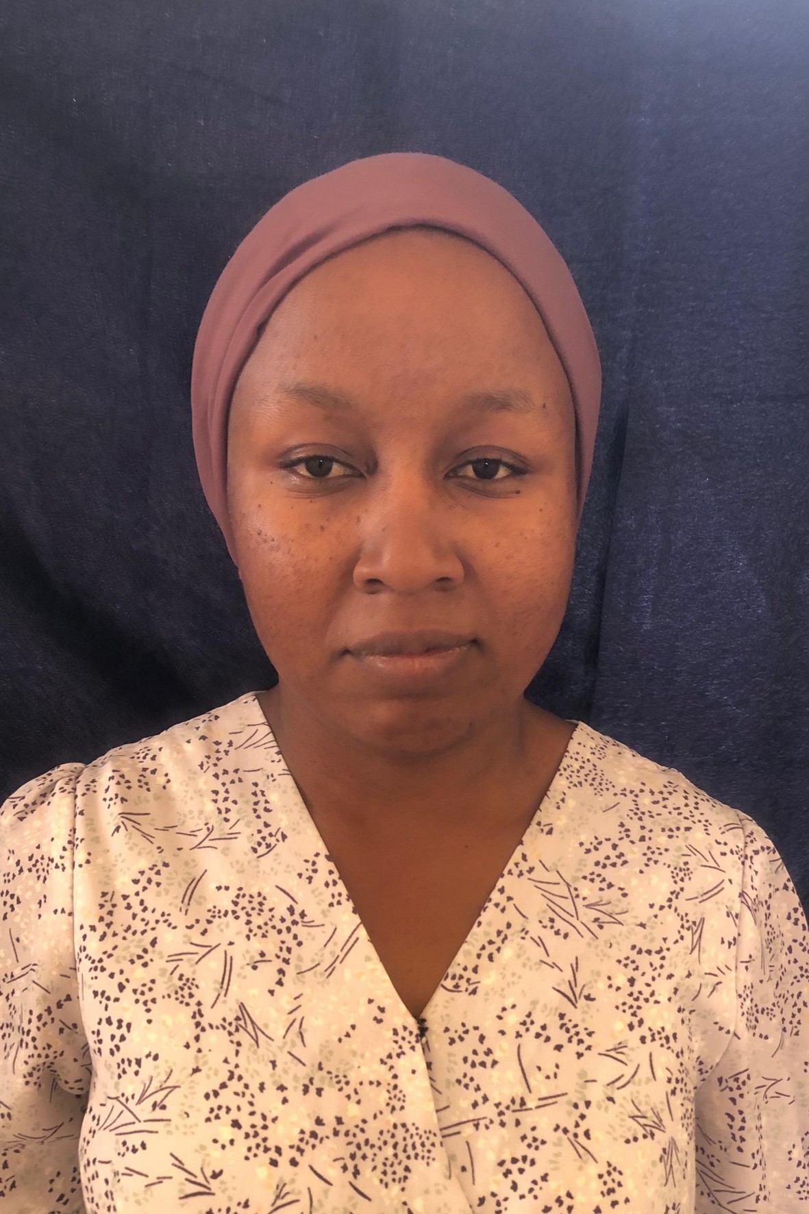 Portrait of Neema B. Enzi